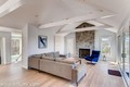 light and airy with cathedral ceilings and a wall of windows.