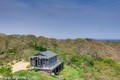 with charming two story guest cottage