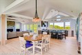 Living room flows gracefully into the dining area