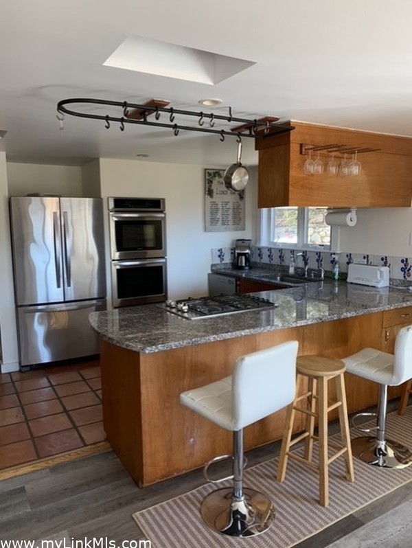 Kitchen Main House with Granite and New Stainless Appliances, Mexican floor tiles