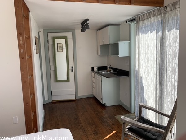 1st floor bedroom with sliders to private deck and outdoor shower