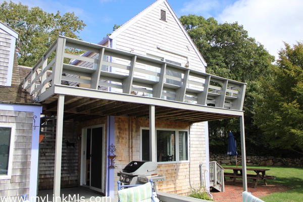 2nd floor Main House Master Deck and Grill on first floor deck