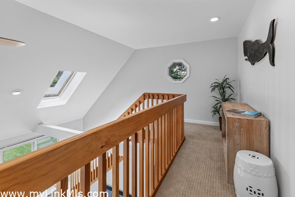 Second-floor landing overlooking the living room