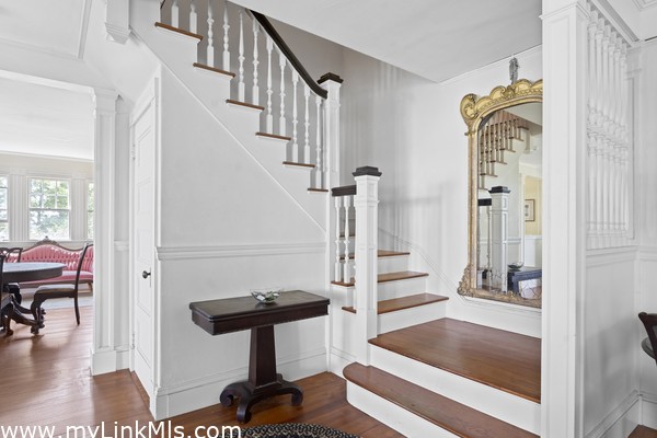 Central staircase in front foyer