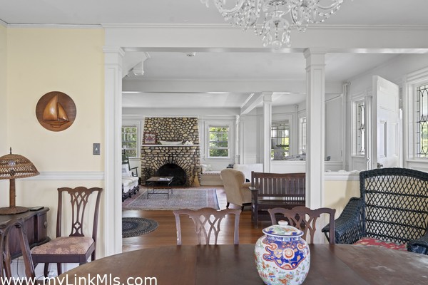 View from the dining room to foyer and living room