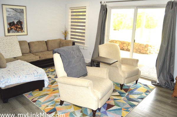 second lounge area, opens to covered patio area