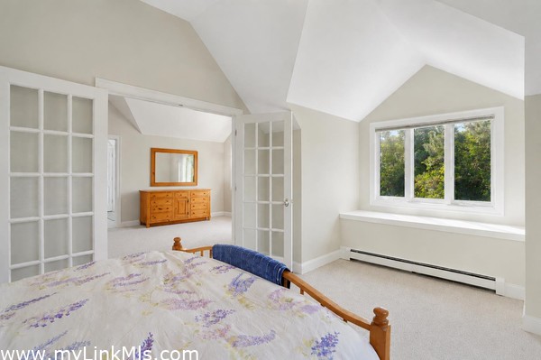 primary en-suite with private lounge area and private exterior deck