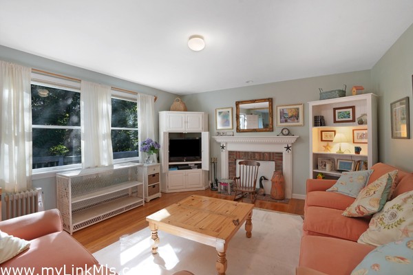 Main living area on second floor with fireplace