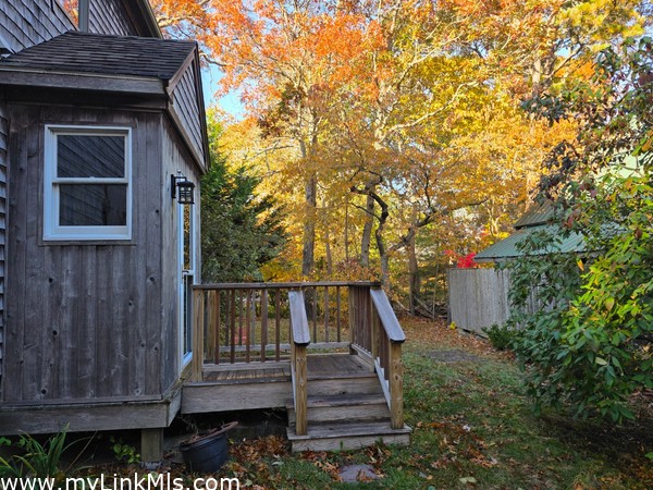 Front door on right hand side of the house