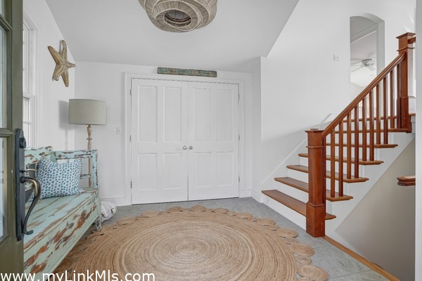 Split level entryway with large closet