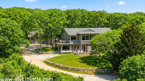 2.7 acres includes the main house and studio