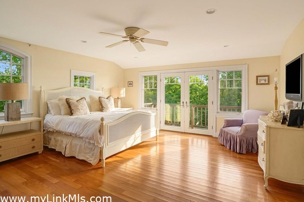 Large primary suite with balcony