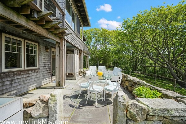 Incredible stone patio and outdoor shower
