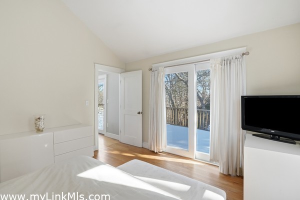 Primary suite to exterior deck.