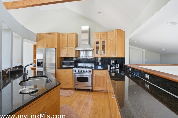 Modern kitchen with stainless steel appliances