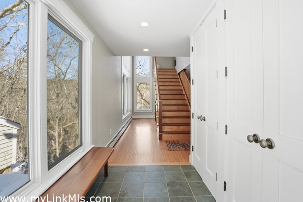 Foyer with three large closets
