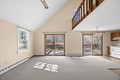 Living-dining area with sliders to the wrap around deck