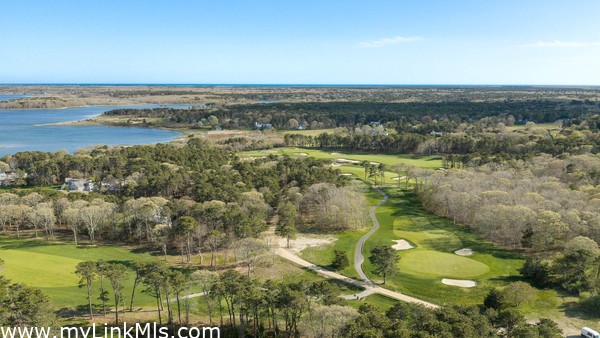 Golf, tennis, private dock and beach, pro shop and restaurant
