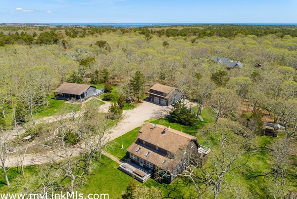Your Vineyard homestead awaits on 3.05 acres abutting conservation land and minutes from miles of sandy south shore beach