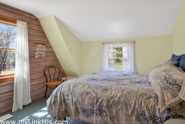 2nd flr - Bedroom 3 charming and bright with wood accent wall