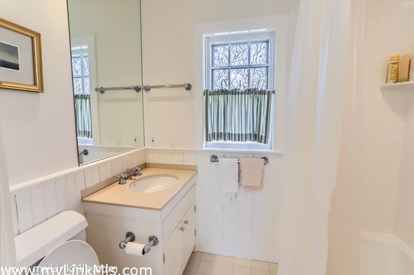 Full Bath For Two Bedrooms Off Kitchen