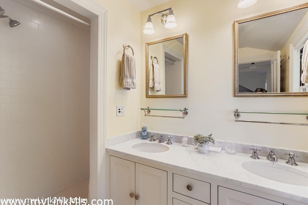 with double sinks and marble countertop