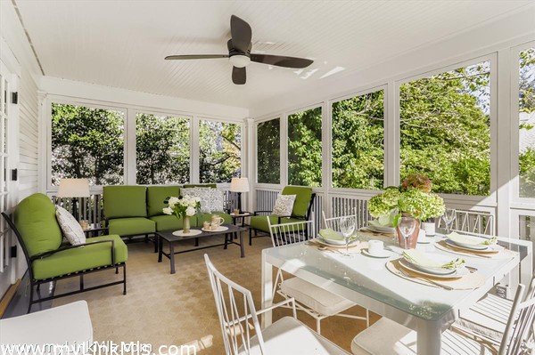 With a fabulous screened porch