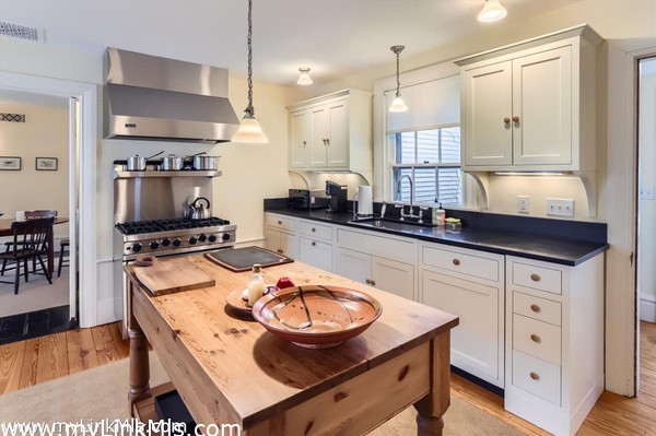 with modern range and integrated appliances