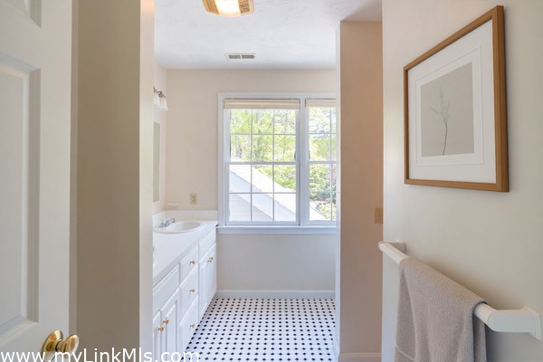 Primary bath with tile floors