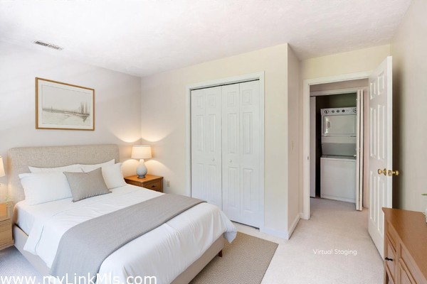 Bedroom 3 with view of hallway and laundry closet