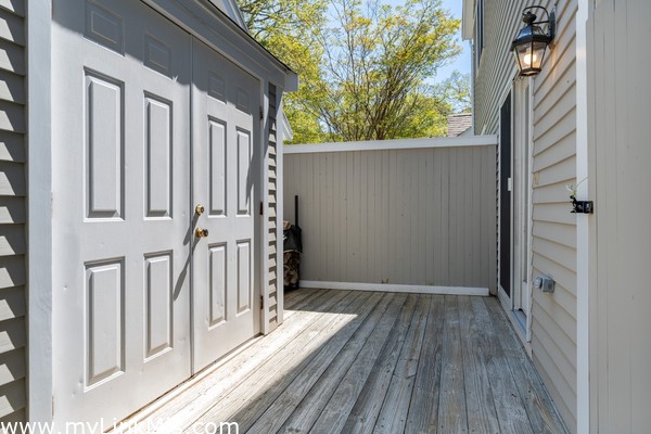 Storage shed, outdoor shower and kitchen access.