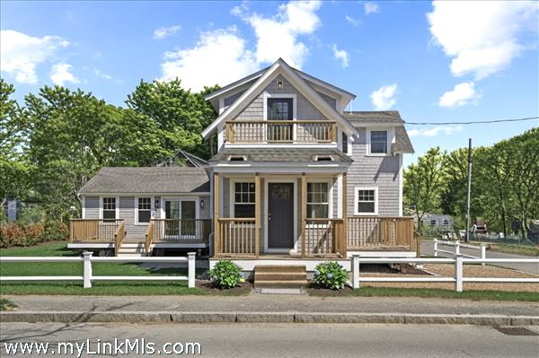 A welcoming front entrance with covered farmer's porch.