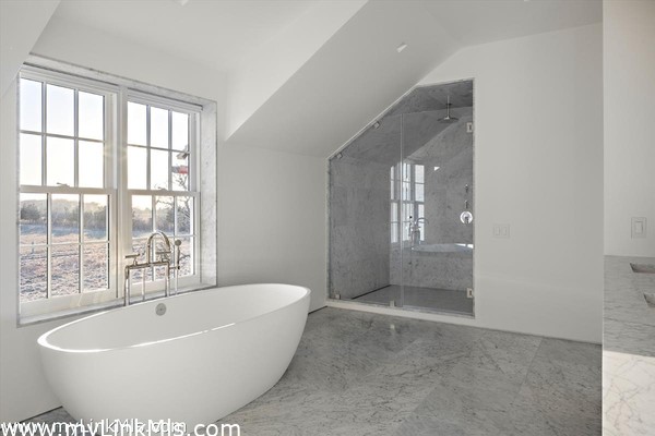 The Farmhouse Primary Bathroom with custom Carrara marble