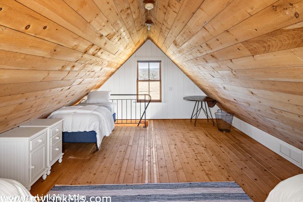 The Bunk House loft with 3 twin beds