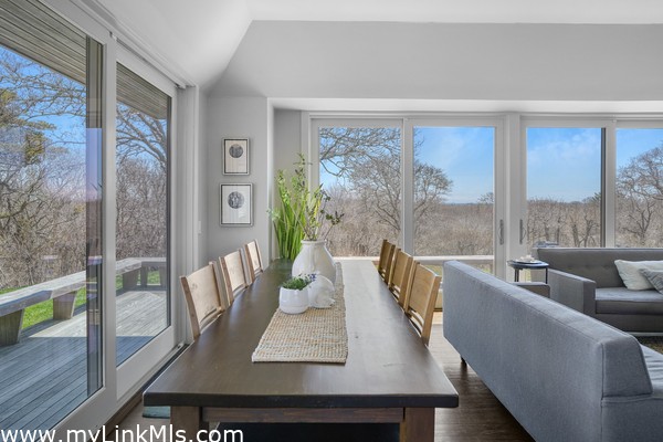 Slider to wraparound decking makes for seamless indoor/outdoor living.