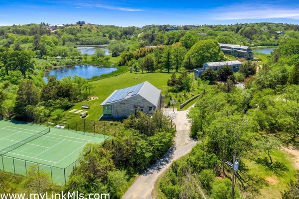 Barn with 6 Car Garage and Gym. Tennis Court