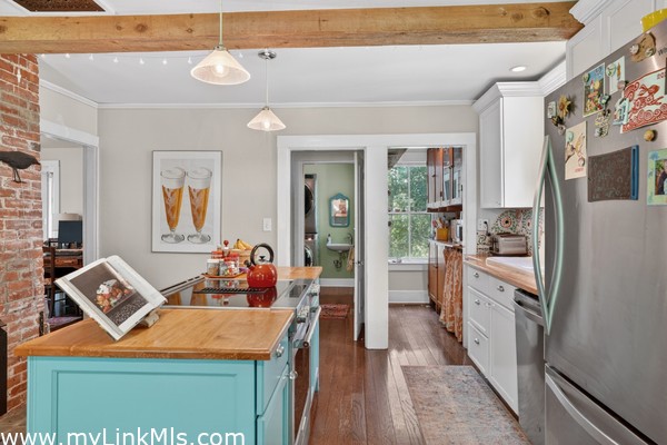 Kitchen Island and cabinets by French Accent