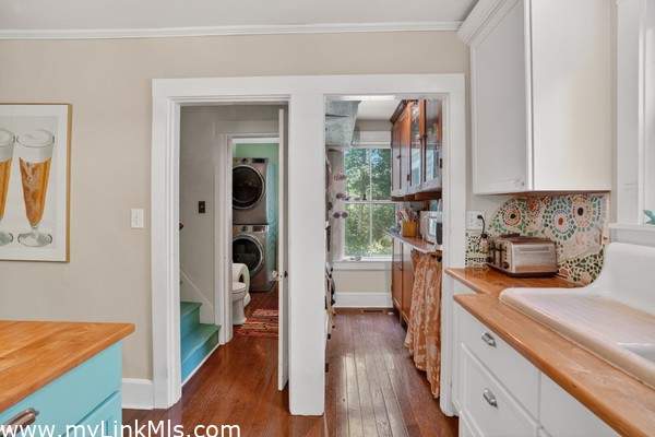Half bath with laundry and walk-in pantry