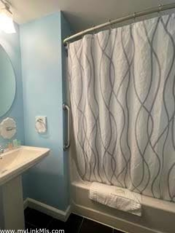 full bath centrally located in condo