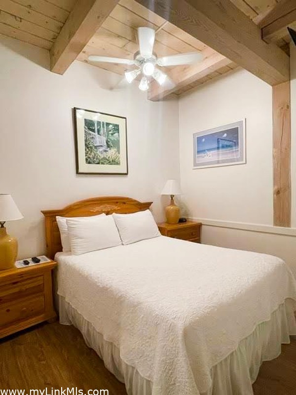Main bedroom has beautiful wood ceilings
