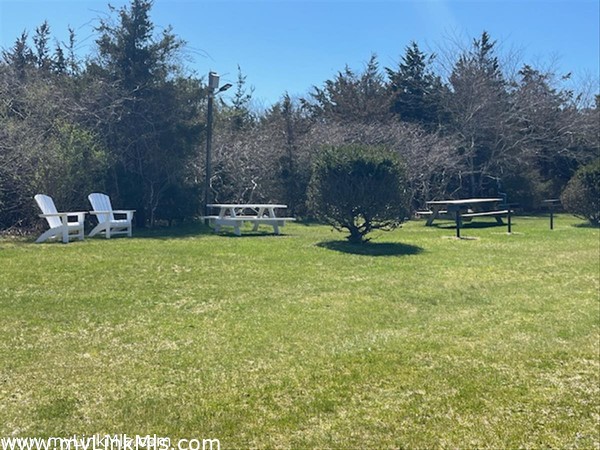 picnic tables, char grill area