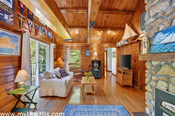 Living Room with stone Fireplace