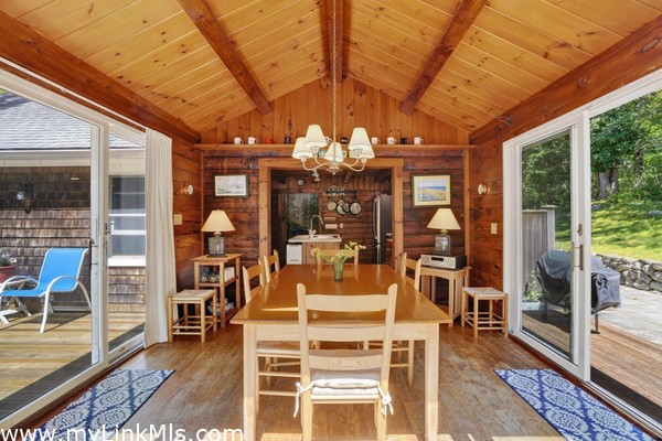 Dining Room looking into the Kitchen. Deck on one side (L) and Terrace on the other (R)