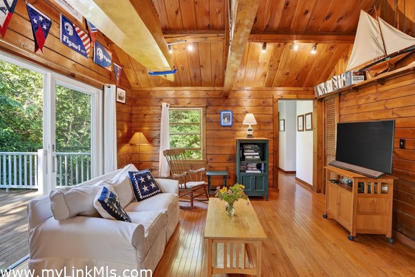 Living Room w/ sliders to the Deck in two spots