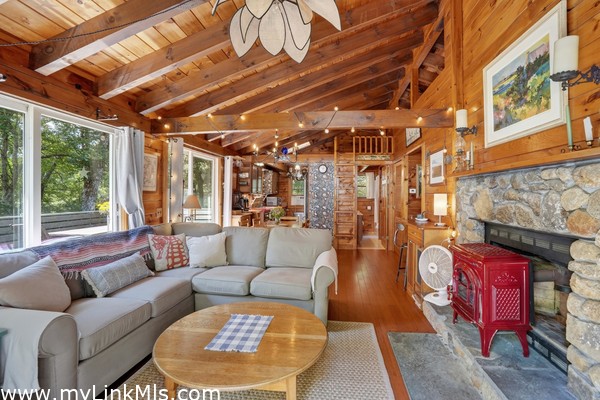 Guest Cottage Living Room with Fireplace and Woodstove