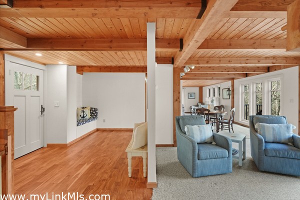 View from kitchen to living area and front entry