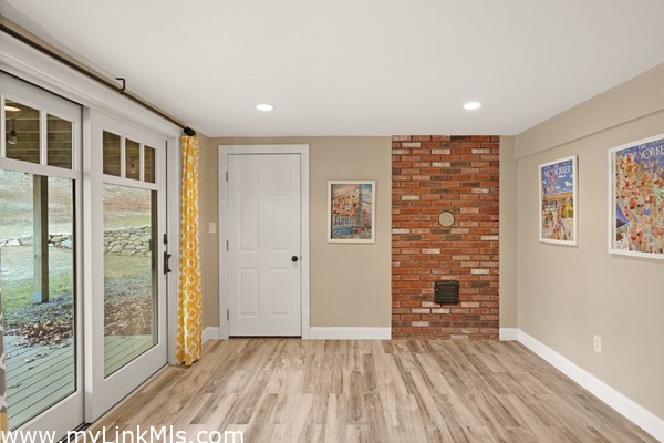 Sliders to yard and door to garage