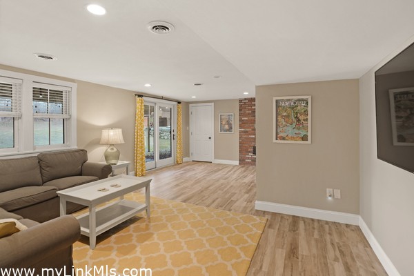 Living area with sliders to backyard