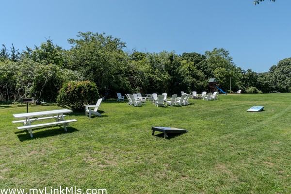 common area has picnic tables and lawn games